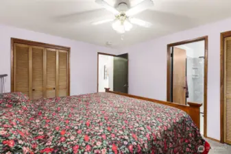 There are two closets and quarter bathroom in primary bedroom