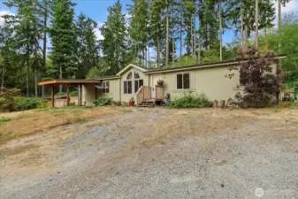 Privacy on 4.1 acres.  Room for a boat or RV to the right.