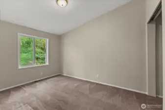 Bonus room looks at the private back yard.