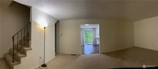 Family room and stairs to upper floor