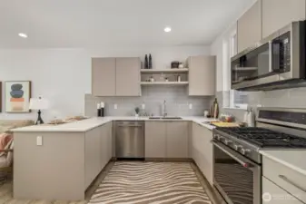 Well-appointed kitchen with stainless steel appliances and custom cabinetry