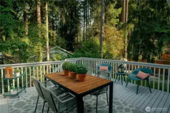 Upper deck off the kitchen/great room. Privacy fencing for your outdoor dining or living space.