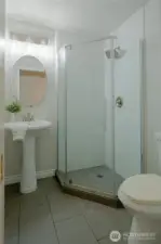 Lower level bathroom located in the office/bedroom