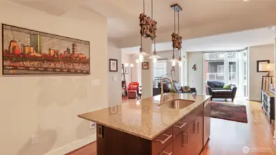 Center island kitchen with pantry and full size stainless steel appliances