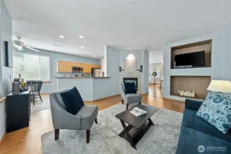 Open-concept 2nd living area, eat-in dining, and kitchen.