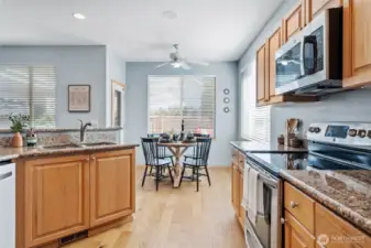 Such a great layout for meal prep and serving at either the formal dining or eat-in dining areas.