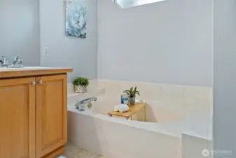 A closer look at the soaking tub with tile surround.
