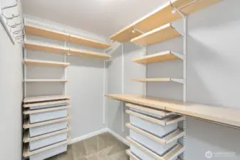 Fantastic walk-in closet with organization system!