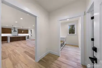 Garage Entry, Mudroom headed into the living room and kitchen