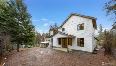 Back yard - Showing no fence but fence will be installed between homes on the East side