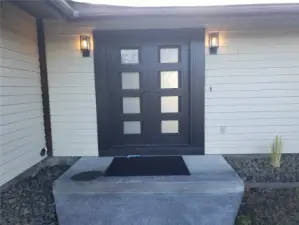The front entry of this beautifully remodeled home just got a beautiful update to the front door.  Come on in!