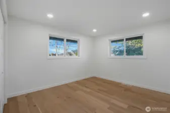 This remodeled third bedroom also has nice bright lights and is at the front of the home on the right side, with a view out to the main street.