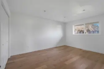 The remodeled fourth bedroom faces the right side of the house and the light fixtures are COMPLETED.