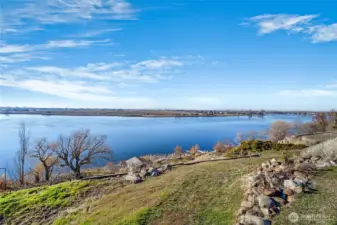The switchback down to the lake starts here as you meander down the path to the 90 feet of waterfront and the secure and clean boathouse.