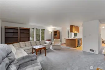 A second living room on the other side of the kitchen. This room is also very large with windows that overlook the front.