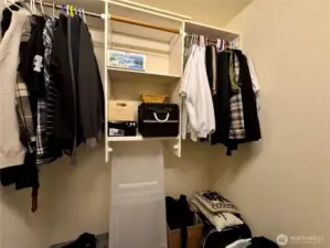 Primary bedroom walk in closet.