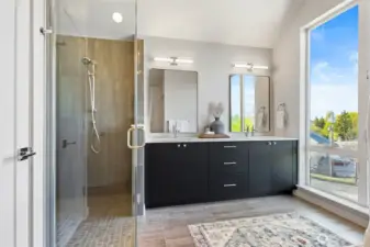 Photos of model home 9752 with similar finishes & floor plan. Indulge in your spa-like ensuite with dual vanities, natural light, and contemporary finishes.