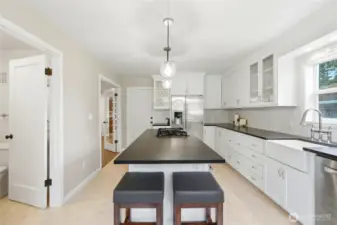 A spacious, beautifully designed kitchen with eating area—where everyday living happens.