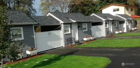 The tiny home remodels included new roofs and fresh paint outside.