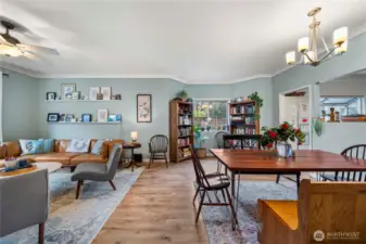This is the living room / dining room with LVP flooring.