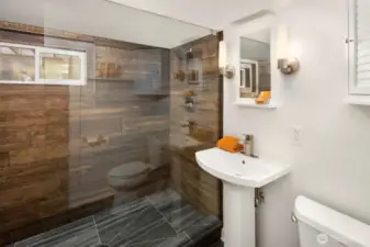 Gorgeous bathroom in the basement apartment has high end finishes.