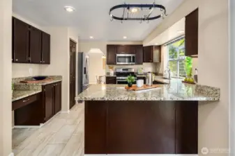 Granite Countertops w the Dining room in the way back
