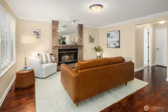 Fireplace Den w Half-Bath to the right, Door to Attached 3 car Garage and Built in Shop-Storage