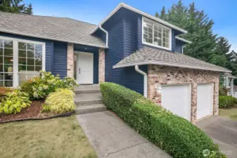 The home has a newer 30+ year architectural roof with leafguard gutters.  The garage is oversized and allows for a workbench and additional storage options.