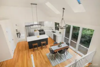 View of the kitchen from the upstairs hallway.