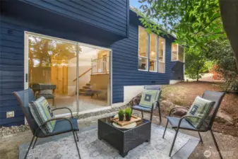 The back patio is a nice cool place to hang out in the summer under the trees amongst nature.