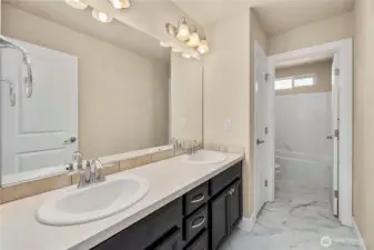Upstairs full bath with private toilet room