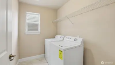 Conveniently located upstairs laundry