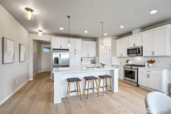Photographs are for illustrative purposes only. Features, finishes, interior/exterior colors, landscaping and floorplan shown may vary from actual homes built.