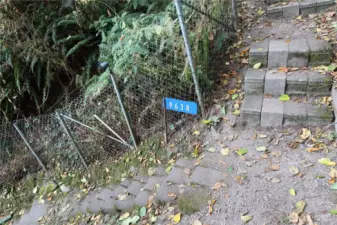 This is the entrance to the property at 9634.  The house at 9638 is to the north of the subject property.  Call 425 351 5100 with questions.