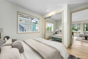 West-facing Bedroom off the Living Room has Mirrored Closet Doors.