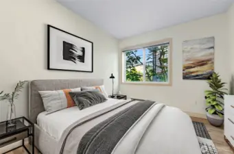 This Bedroom is located off the Entry Hall and has a Treed outlook facing North.