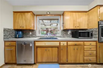Garden window over looks beautiful backyard