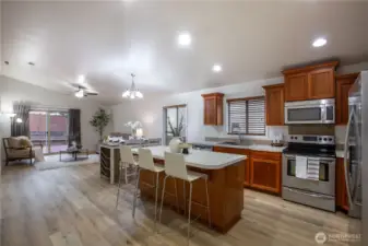 Open concept kitchen/living area.