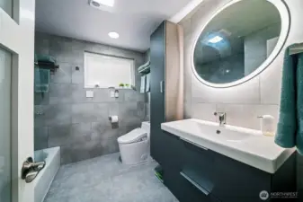 The main bath is tricked out and fully updated. Remote controlled bidet, dimmable and steam-reducing mirror, plus hands free water faucet are just the start...