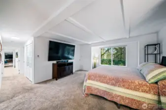 Spacious split master bedroom with two walk in closets