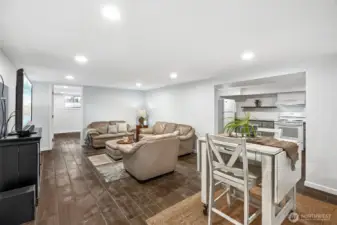 Spacious living and dining area in basement.