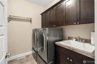 Laundry opposite mud room, just where it should be!