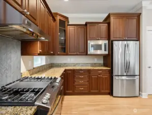 Plenty of countertop and storage space in this open kitchen.