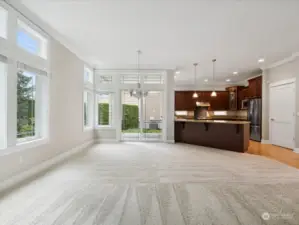 Wall of windows and high ceilings makes this light and bring living space the perfect place to call home.