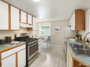 Unit A: Galley style kitchen with ample storage.