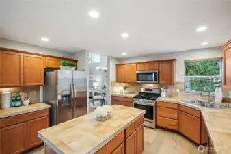 Stainless appliances and full-height backsplash add to the appeal of this kitchen.