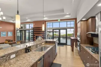 The Community room has waterfront access, full kitchen facilities, double sided fireplace and indoor - outdoor uses.