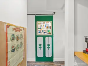 Pantry area off the kitchen with custom doors