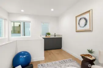 Elevate your evenings with a stylish wet bar and dining area. Perfect for intimate dinners or lively cocktail hours.