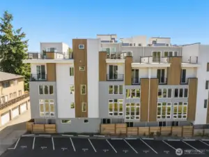 Yes, parking! The builder has paid for 5-years of leased onsite parking in the lot next door!